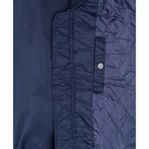Snap-button front pocket detail with durable metal fastener