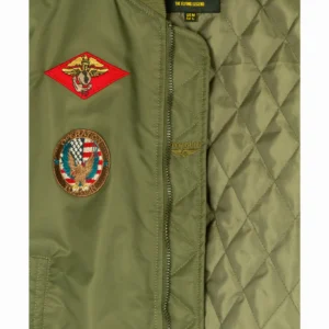 Full length lifestyle view of Miss Top Gun patched jacket paired with denim