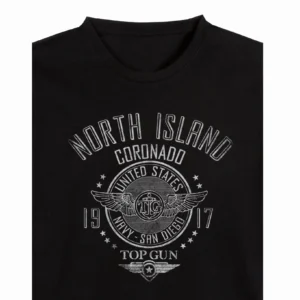 Close-up detail of reinforced crew neckline and vintage lettering on Coronado shirt