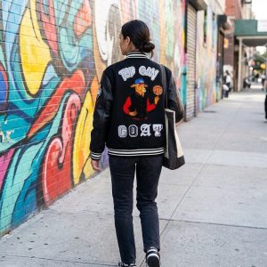 top gun new goat varsity jacket lifestyle female.webp